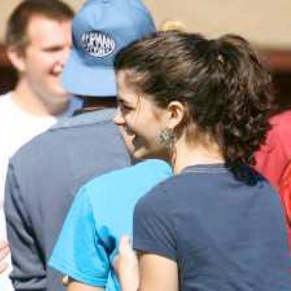 RPI student outside chatting with a friend